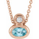 14 Karat Rose Gold 5x3 mm Oval  Blue Zircon and .03 Carat Diamond 16 inch Necklace