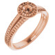 Halo Style Engagement Ring Mounting in 10 Karat Rose Gold for Round Stone.