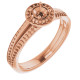 Halo Style Engagement Ring Mounting in 14 Karat Rose Gold for Round Stone..