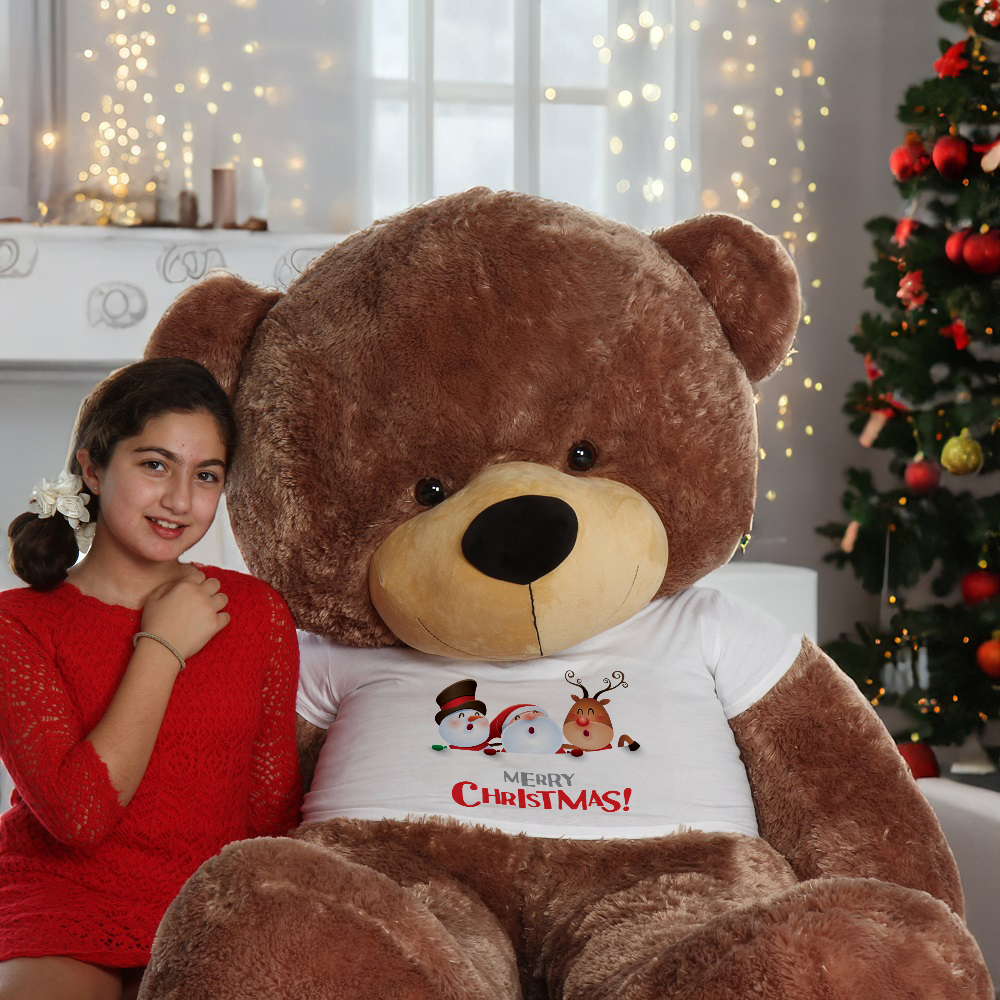 A Girl is Posing Next to a Large Teddy Bear