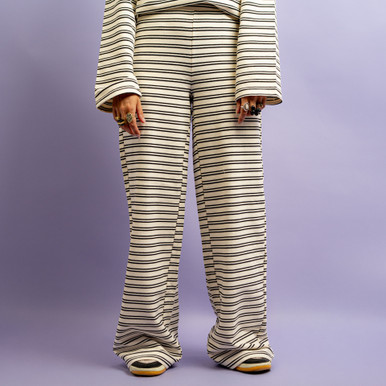 Pantaloni bianchi a righe nere