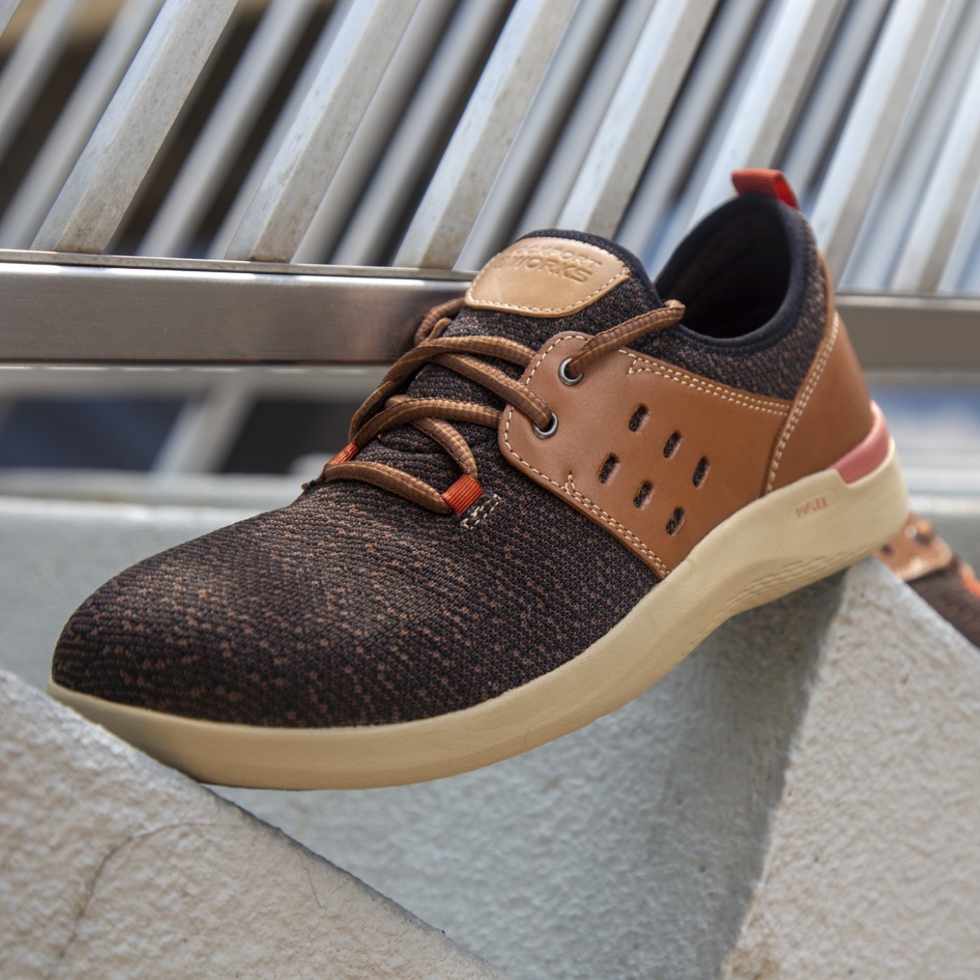 img-6839-rk4690-truflex-square-1400.jpg Men’s 2-eye work sneaker posed on concrete stairs