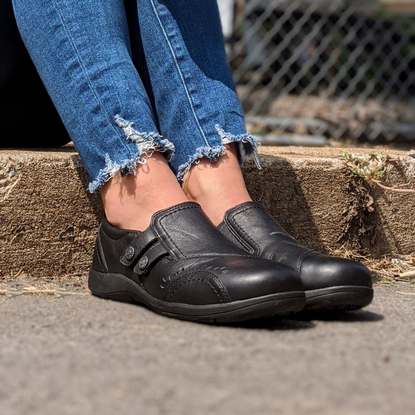 rk761-square-1400px.jpg woman sitting on curb wearing dress work slip on shoes in model RK761