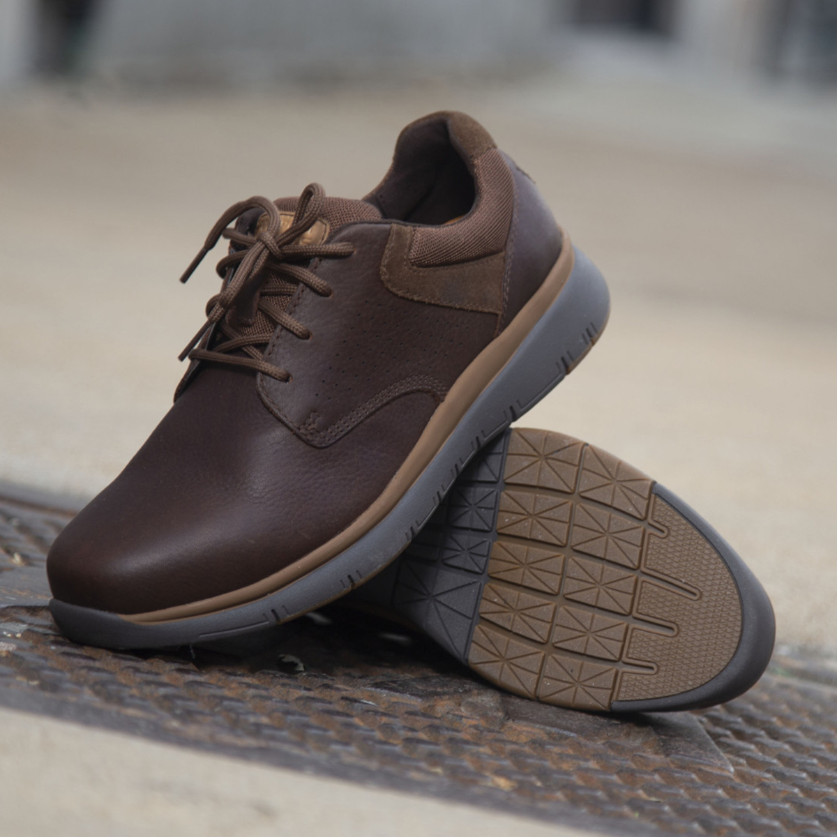 rockport-rk5700-2-1200x1200.jpg Closeup of men's work shoes in style RK5700 posed on a sidewalk