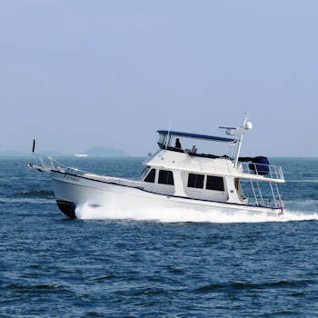 Cabin cruiser underway offshore