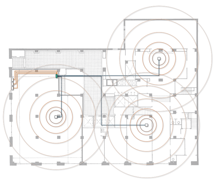 Office floor with a cell signal booster system and 4 dome antennas