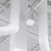 Dome antenna suspended from an open ceiling