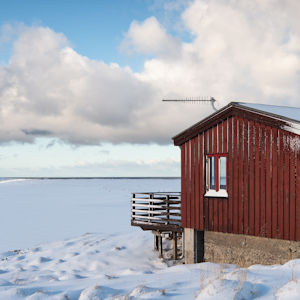 Rural SureCall Fusion Professional cell signal booster TS563121 with high-gain antenna installed on a house