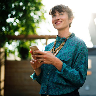 Happy woman with smartphone