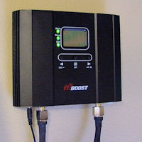 HiBoost Home 15K booster mounted on a wall