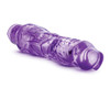 Close-up of the Blush Wild Ride vibrating dildo in purple, showing the textured realistic shaft and waterproof vibrating base built for powerful internal stimulation.