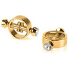 Close-up of gold-tone magnetic nipple clamps showing ring shape and polished metal construction designed for comfortable, adjustable pinch sensation