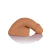 Side profile of the tan brown packer highlighting its curved shape, soft construction, and balanced proportions. Designed to sit comfortably in underwear for everyday packing.