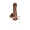 product image of the Peekaboo Uncut Vibrating Dildo showing its curved shaft, detailed texture, and suction cup base with USB recharging cord