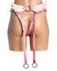 Back view of the harness highlighting soft white wing panels and an open-back cut, with pink straps framing the rear for a clear view of the winged design.