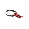 Side-angle product shot of the Dragon’s Lick Vibrating Demon Tongue, highlighting the profile of the textured silicone tongue and the adjustable harness strap with metal ring attachments.