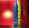 Evolved Straight Forward waterproof rechargeable slimline vibrator, as shown next to a measuring tape showing the full size dimensions