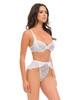 Front view of the Oh La La Cherie Elena Embroidered Bra & Skirted Panty Set featuring sheer white mesh, floral embroidery with delicate blue accents, an unlined underwire bra with satin bows, and a high-rise skirted G-string.