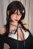 Close-up of IronTech Kitty silicone sex doll with long brunette hair, gray eyes, and black-and-white lace top.