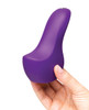 Purple We-Vibe Shared Touch held upright in one hand.