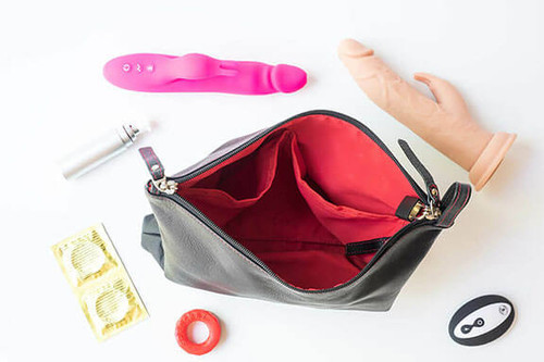 The Sultra Leather Toy bag features organizes all your lubes and sex toys