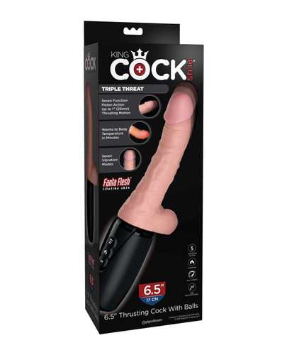 A lifelike 6.5-inch thrusting vibrator with a soft, realistic skin tone and detailed texture, featuring a pronounced head and sculpted balls, displayed upright against a clean white background to highlight its shape and dual-density design.