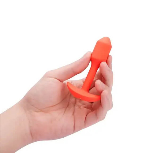 Small Orange B-Vibe Vibrating Weighted Snug Plug - plug 1