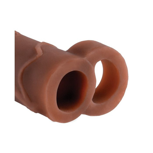 This Fantasy penis extender features a hollow design and a testicle strap to keep it in place