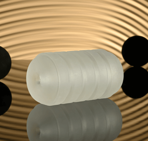 Clear compact male stroker with ribbed texture, open-ended design