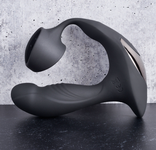 Prostate stimulator with attached cock ring