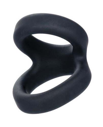 A matte black dual-loop silicone cock ring, featuring a thicker upper loop connected to a wider lower ring designed to support the shaft while gently stretching the scrotum. The smooth, body-safe finish and ergonomic contours emphasize comfort and flexibility.