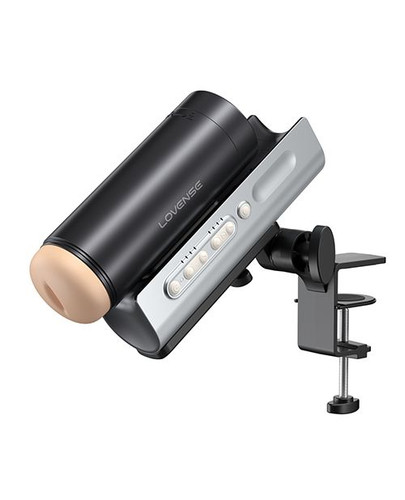 Lovense Solace Pro hands-free stroker mounted on desk stand demonstrating adjustable positioning and interactive syncing capabilities.