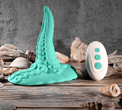 Vibrating tentacle grinder with suction base and remote control, featuring flexible silicone tentacle design