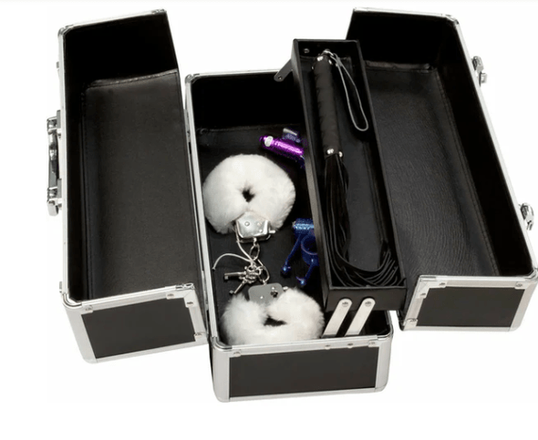 Open lockable sex toy storage case with organized compartments holding vibrators and accessories, demonstrating secure, discreet, and structured storage design.