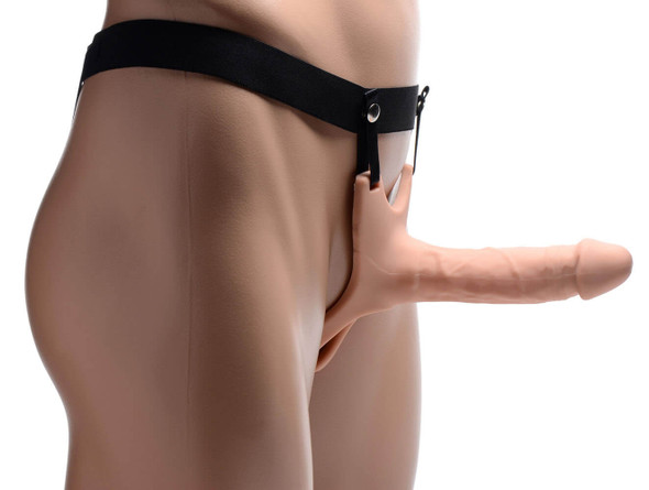 Size Matters Hollow Dildo Strap-On displayed on male model, featuring elastic support harness and realistic sculpted shaft displayed from an angled side view.