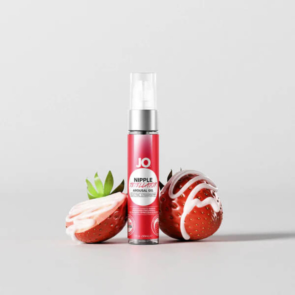 JO Nipple Titillator Strawberry Nipple Arousal Gel shown beside fresh strawberries. The product features an Electric Strawberry flavor and is designed to enhance nipple play, breast worship, and foreplay with a cooling, tingling sensation.