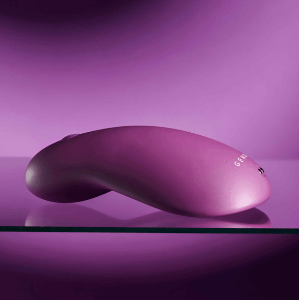 Side profile of the Gender X BJ Buddy in purple silicone with simple one-touch controls