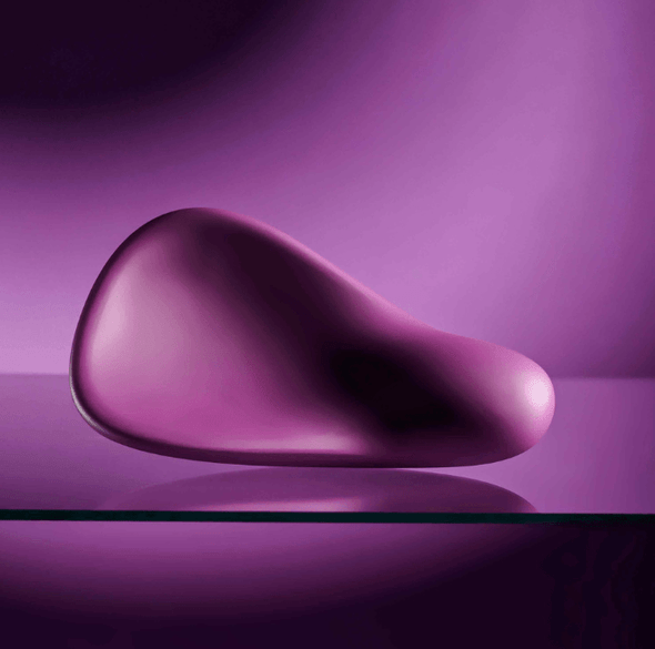 Close-up of the Gender X BJ Buddy's curved, non-representational shape highlighting its ergonomic design for ball play, grinding, and versatile stimulation across different bodies.