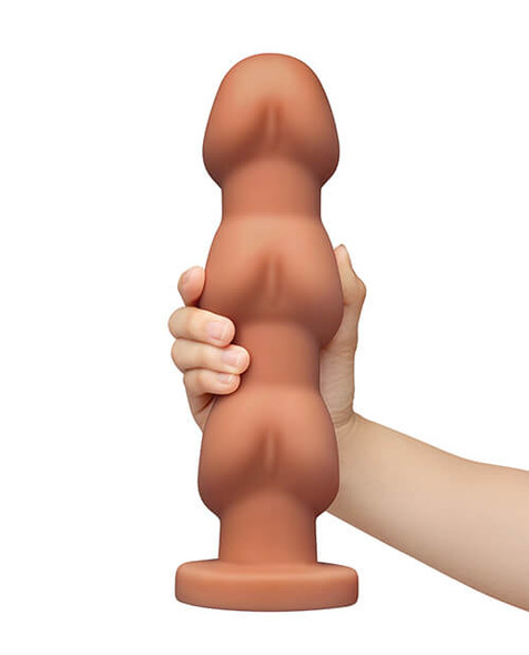 b-Vibe Headz 10.5 Inch Multi-Bulb XXL Dildo held in hand to show its massive scale and size