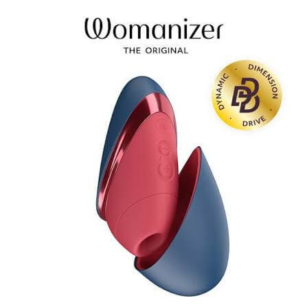 Womanizer Liberty NEXT blue and red clitoral stimulator with protective cap open.
