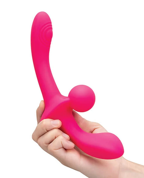 Together Double Tap Double-Ended Vibrating Strapless Strap-On with center clitoral stimulator held in hand