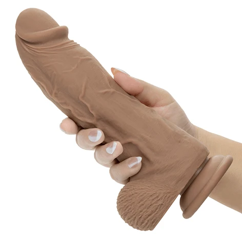 BDE STud in brown held in hand