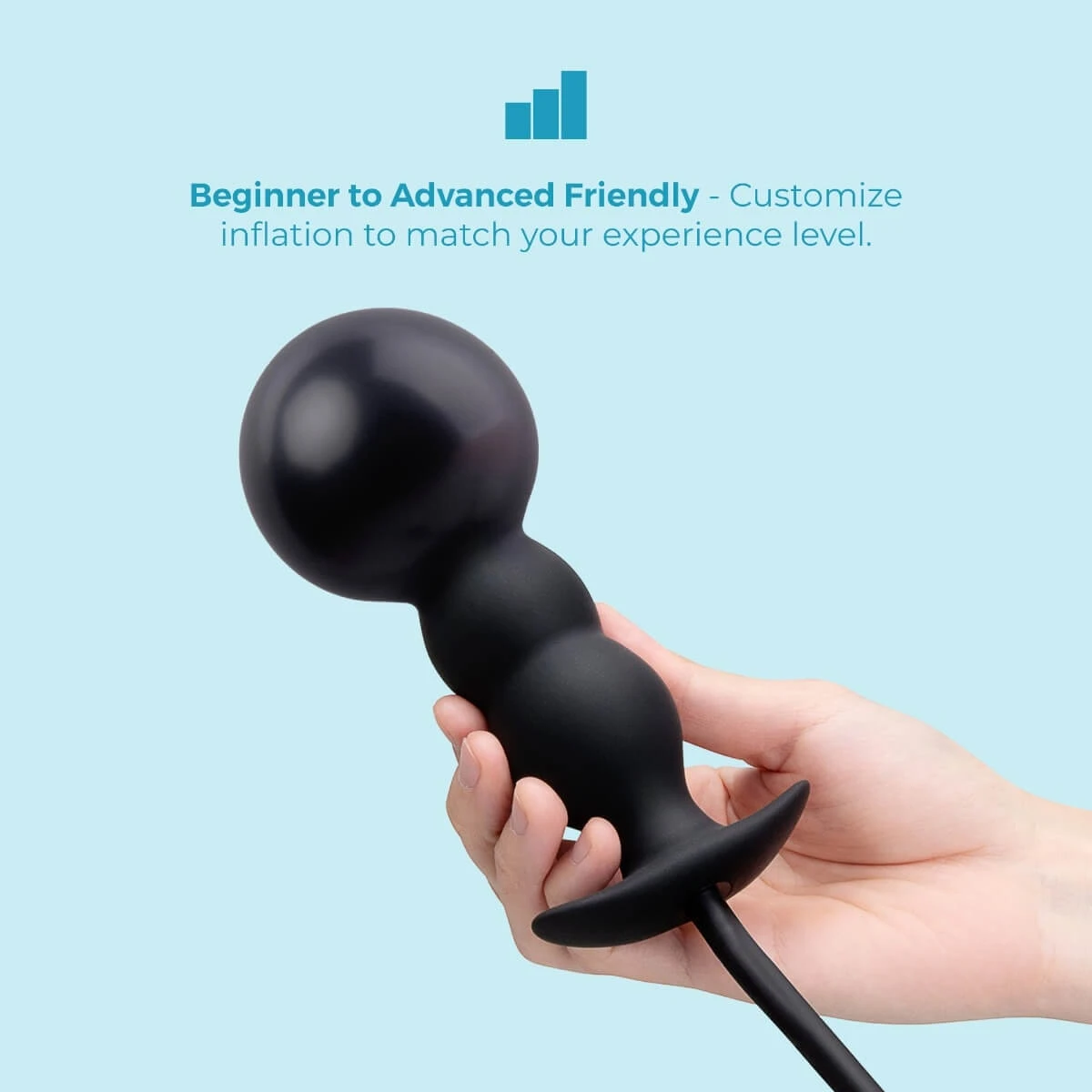 the b-Vibe Beaded Inflatable Anal Plug shown in hand with rounded inflated tip