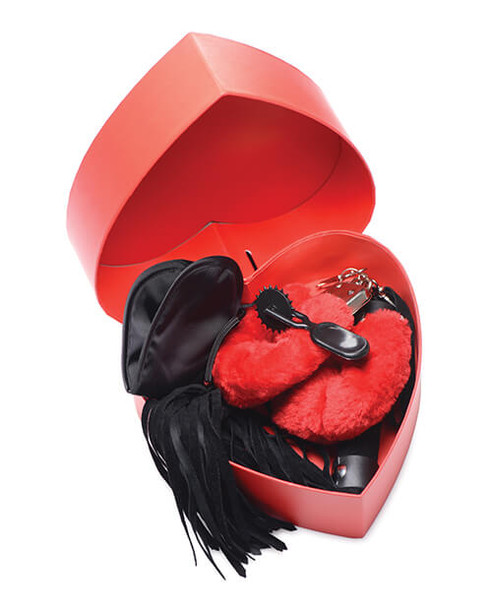 A heart-shaped box filled with bondage gear