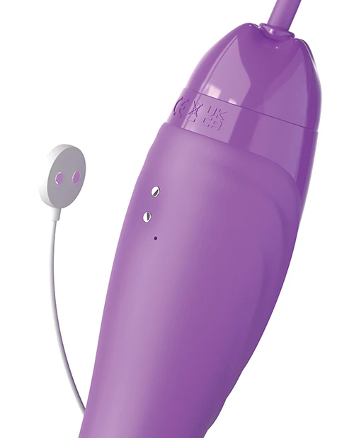 Detail of the Ultimate Pleasure Max's purple handheld controls for suction, tongue stimulation, and vibration.
