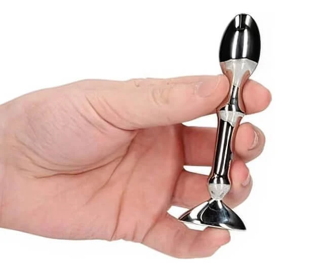 Stainless steel tempo plug held in hand