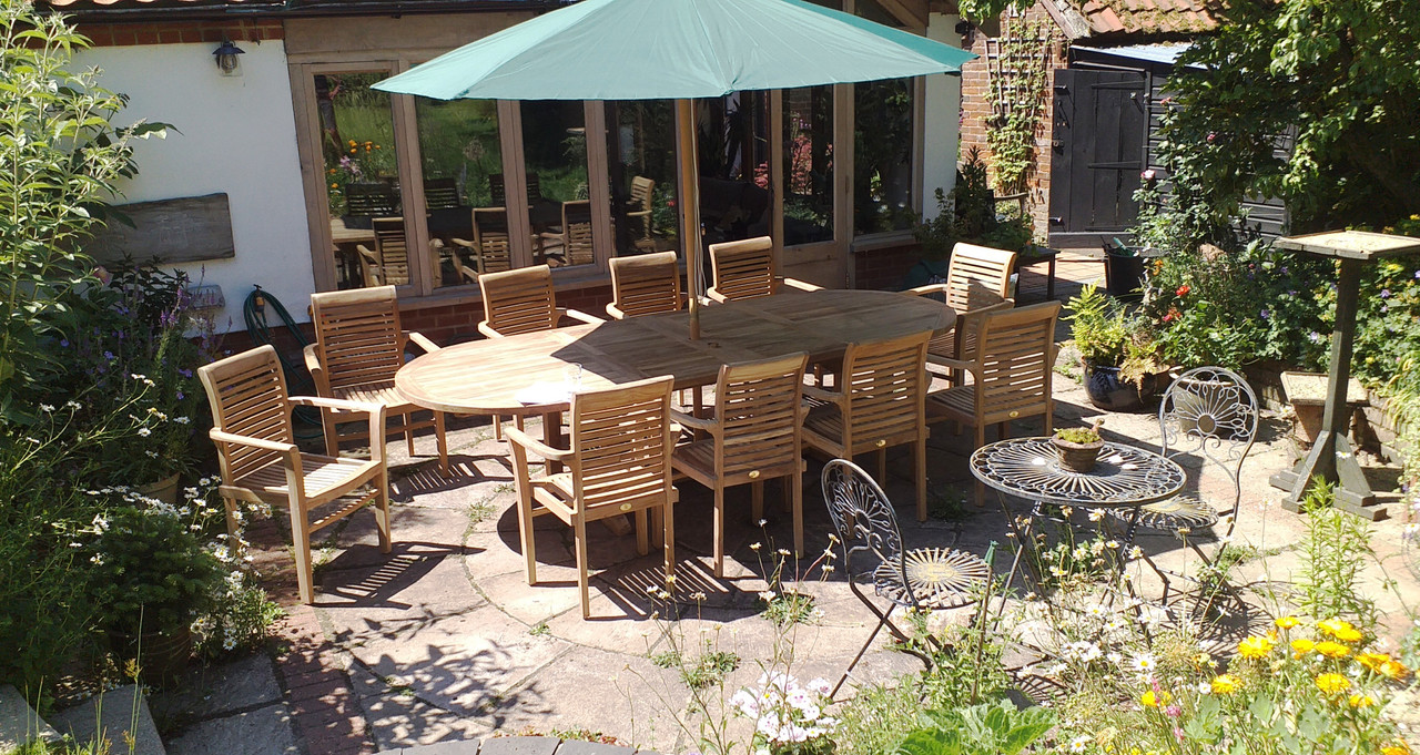 Oval Extending Teak Double Leaf Table and Chairs