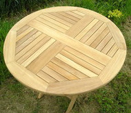 ​Do What You Enjoy Around the Folding Round Teakwood Table 