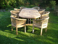 ​Oval Extending Double Leaf Teak Table