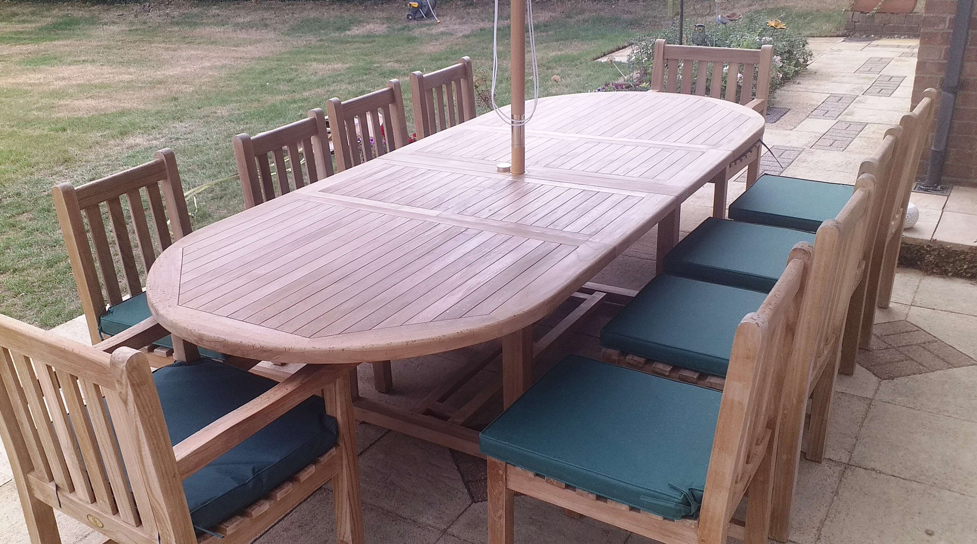 UK Suppliers Of Oval Teak Extending Double Leaf Table Set with Southwold Chairs